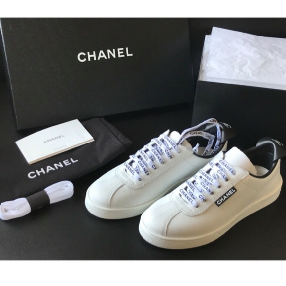 CHANEL Shoes - CHANEL White Leather LaceUp Weekend Sneakers